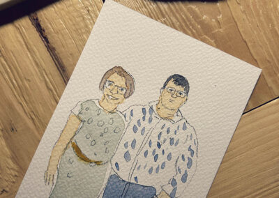 Portrait aquarelle d’un couple de mariés réalisé en direct pendant leur mariage en Alsace.